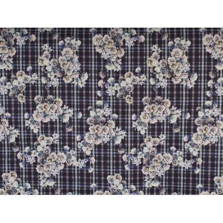 Tissu en coton à motifs carreaux et fleurs.