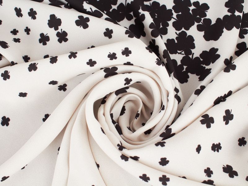 Poli Sorella fleurs noires rapport