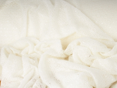 Maglione di maglia con delicati paillettes.