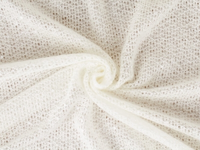 Trikotāžas džemperis ar maigu spīdumu.