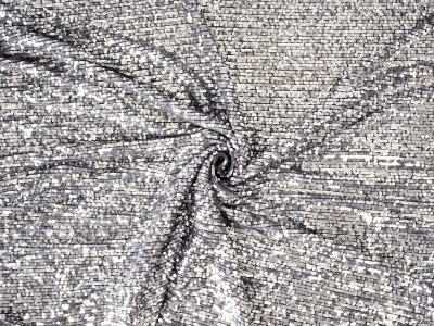 Sequins on elastic tulle