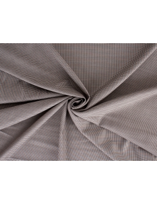 Wool fabric in a fine black-and-white houndstooth pattern