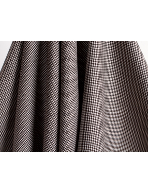 Wool fabric in a fine black-and-white houndstooth pattern