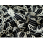 Algodão bordado com padrão floral vazado — preto com ecru.