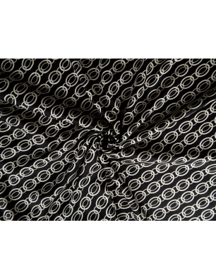 Viscose fabric with a delicate sheen — chain-like pattern on a black background