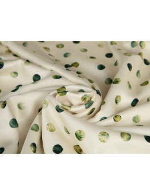 Viscose fabric with a delicate sheen — cream with marbled polka dots