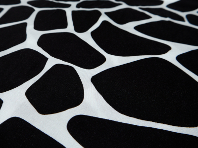 Viscose fabric for a dress in a black-and-white geometric pattern