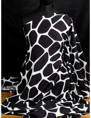 Viscose fabric for a dress in a black-and-white geometric pattern