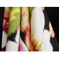 Viscose fabric for a dress in a red-orange floral pattern
