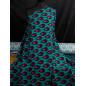 Viscose with elastane twill in a geometric turquoise and pink pattern