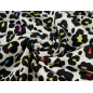 Viscose fabric for a dress with a colorful leopard print on a light background