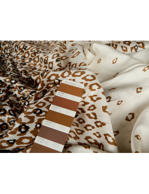 Viscose fabric with a subtle sheen, cream-colored with a panther print - report - Fabric Wholesale Bemax