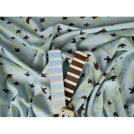 Viscose fabric for a blue dress with birds