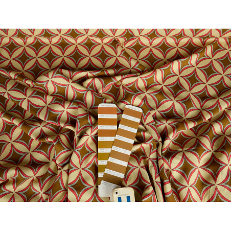 Viscose fabric for a dress in a brown geometric pattern