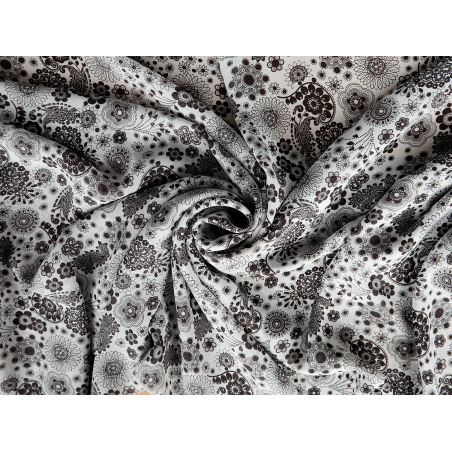 Viscose chiffon blanc avec de délicates petites fleurs noires - Grossiste en tissus Bemax