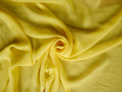 Viscose chiffon with delicate white dots on a yellow background - Bemax Fabric Wholesale