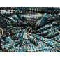Silk satin with a turquoise and beige geometric pattern