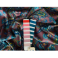 Silk satin with elastane in turquoise paisley patterns on a pinkish beige base