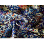 Silk satin with elastane in a light blue mosaic floral pattern