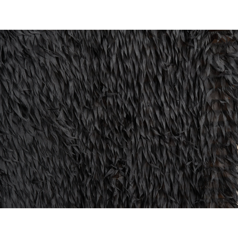 Material with sewn-on feathers made of organza