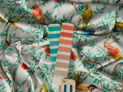 Silk satin touch with elastane, cream-colored with a botanical pattern with small birds